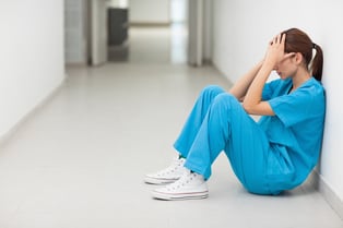 benefits of ergonomics in the medical field - tired nurse